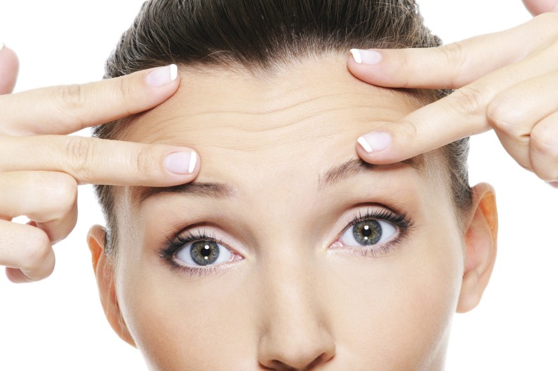 causes of acne on forehead