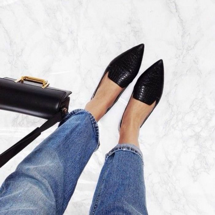 Pointed flat loafers are the exclamation point on relaxed outfits. Image: theyallhateus.com